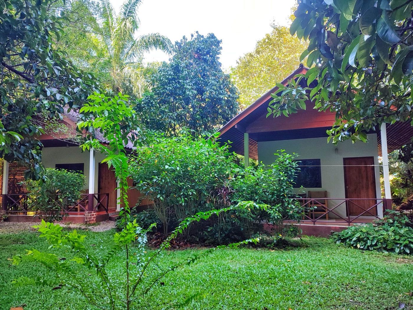 Bungalows set in a green lawn