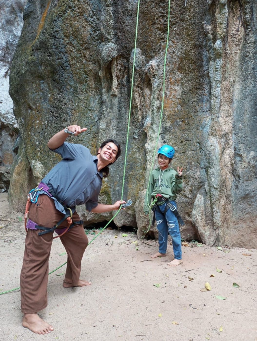 An instructor coaching a climbing session
